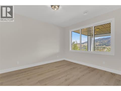Lower Level Bedroom #2 at 2150 Montenegro Drive, Black Mountain, Kelowna