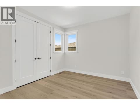 Main Floor Bedroom #3 at 2150 Montenegro Drive, Black Mountain, Kelowna
