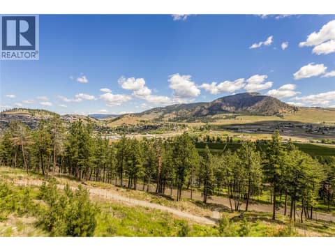 Unobstructed Mountain Views at 2150 Montenegro Drive, Black Mountain, Kelowna