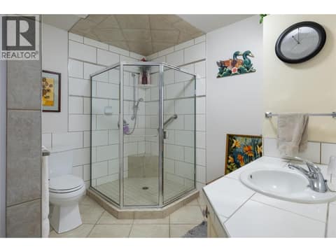 3 piece downstairs bathroom at 3944 Cascade Drive, East Hill, Vernon