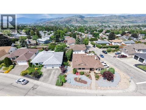 Front aerial view over Cascade at 3944 Cascade Drive, East Hill, Vernon