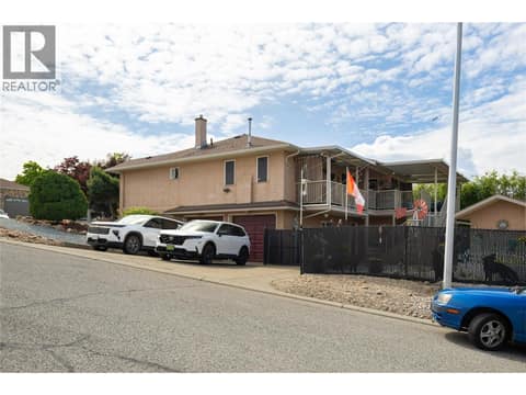 Side view and driveway at 3944 Cascade Drive, East Hill, Vernon