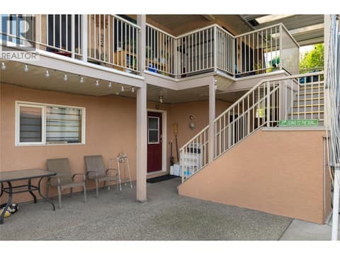 Stairs to covered deck at 3944 Cascade Drive, East Hill, Vernon