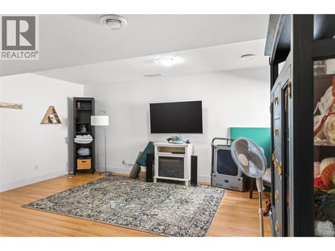 Downstairs versatile Rec/Flex Room at 6552 Blackcomb Place, Foothills, Vernon