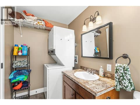 Suite laundry at 6552 Blackcomb Place, Foothills, Vernon