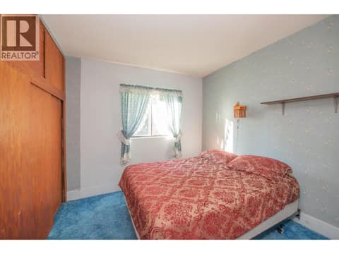 Second main floor bedroom at 2471 6 Highway, Lumby Valley