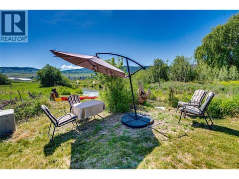 Sitting area by the creek at 2727 Lakeshore Road Unit# 106, Okanagan Landing, Vernon