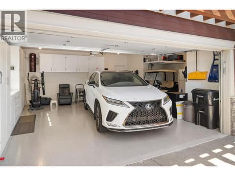 Epoxy flooring and plenty of extra storage space with built-ins at 108 Mashie Crescent, Predator Ridge, Vernon