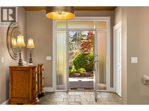Front Entrance at 108 Mashie Crescent, Predator Ridge, Vernon