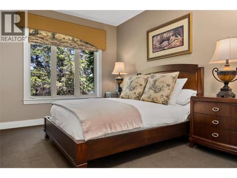 Lower level bedroom  with own ensuite at 108 Mashie Crescent, Predator Ridge, Vernon