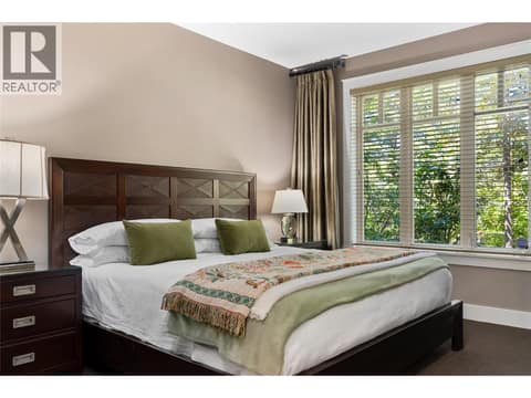 Second lower level bedroom with ensuite at 108 Mashie Crescent, Predator Ridge, Vernon