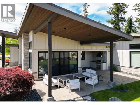 Covered Patio Off of Living Room at 683 HAVENCREST Court, Predator Ridge, Vernon