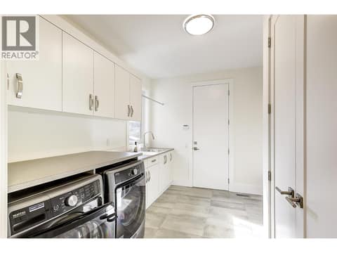 Laundry / Mud Room at 683 HAVENCREST Court, Predator Ridge, Vernon