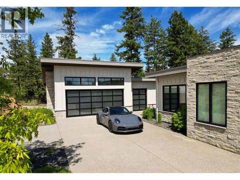 Oversized Garage with Golf Cart Garage at 683 HAVENCREST Court, Predator Ridge, Vernon