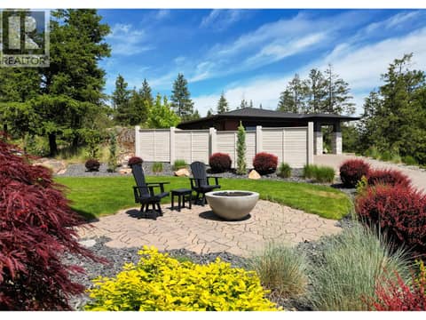 SideYard with Privacy Fence at 683 HAVENCREST Court, Predator Ridge, Vernon