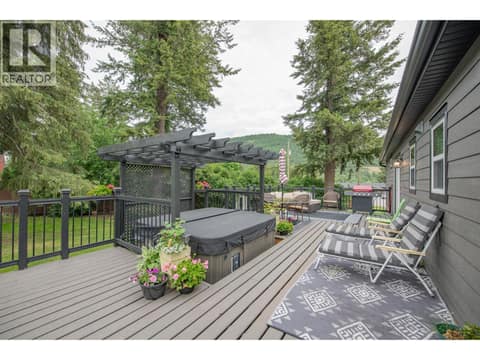 Private Back Deck with Hot Tub at 272 Lumby Mabel Lake Road, Lumby Valley
