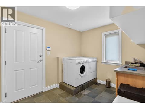 Laundry room - entry to garage at 7769 Okanagan Landing Road Unit# 7, Okanagan Landing, Vernon
