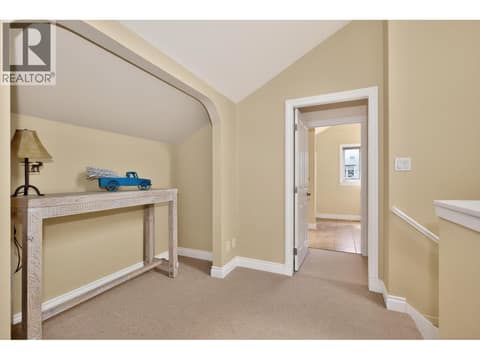 Top of the stairs to the primary and bedroom 2 at 7769 Okanagan Landing Road Unit# 7, Okanagan Landing, Vernon