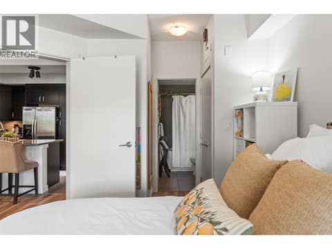 Bedroom with Ensuite and Patio Access at 7343 Okanagan Landing Road Unit# 1118, Okanagan Landing, Vernon