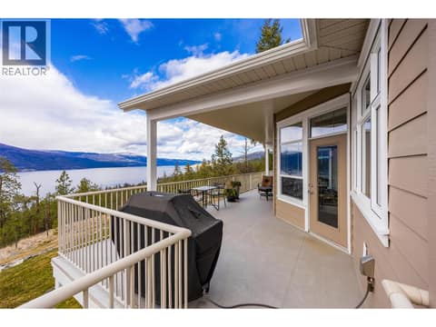 Gas BBQ, partially covered deck. Staircase off deck to below. at 10726 Nighthawk Road Unit# 60, Lake Country North West