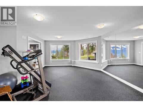 Gym with wall to wall mirrors. at 10726 Nighthawk Road Unit# 60, Lake Country North West