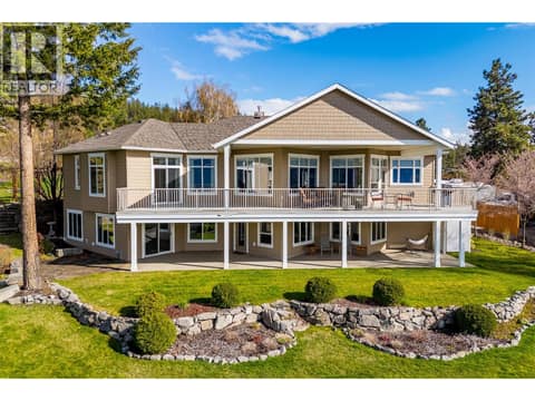 Large partially covered deck, walkout lower level with covered patio. at 10726 Nighthawk Road Unit# 60, Lake Country North West