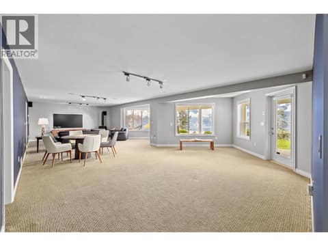 Large recreational room with walk out access. at 10726 Nighthawk Road Unit# 60, Lake Country North West