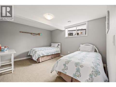 Lower level bedroom. at 10726 Nighthawk Road Unit# 60, Lake Country North West