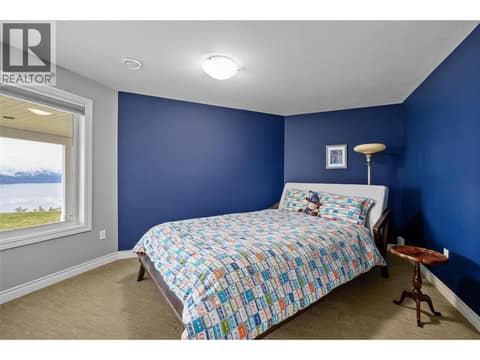 Lower level bedroom with beautiful view. at 10726 Nighthawk Road Unit# 60, Lake Country North West