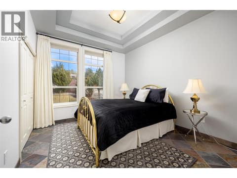 Main floor guest bedroom. at 10726 Nighthawk Road Unit# 60, Lake Country North West