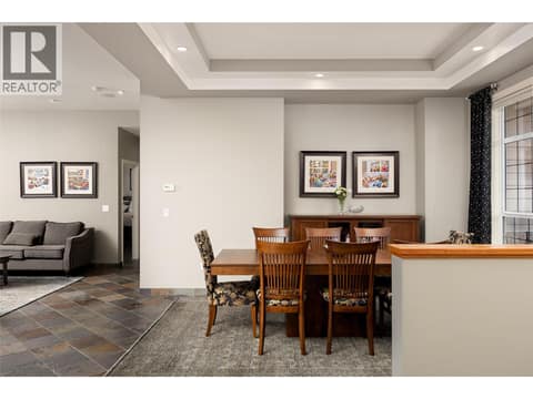 Open concept to the living room and foyer. at 10726 Nighthawk Road Unit# 60, Lake Country North West
