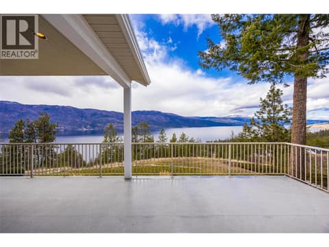 Patio access from primary bedroom. at 10726 Nighthawk Road Unit# 60, Lake Country North West