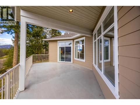 Patio access to primary bedroom. at 10726 Nighthawk Road Unit# 60, Lake Country North West