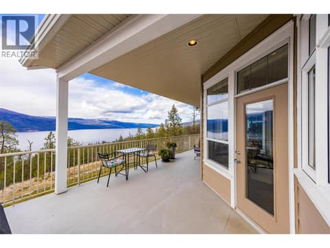 Phantom screens between kitchen and deck, partially covered. at 10726 Nighthawk Road Unit# 60, Lake Country North West