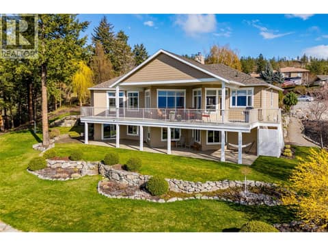 Staircase from deck to lower level. at 10726 Nighthawk Road Unit# 60, Lake Country North West
