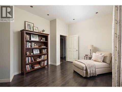 Virtually Staged - lounge area in the primary bedroom. at 10726 Nighthawk Road Unit# 60, Lake Country North West