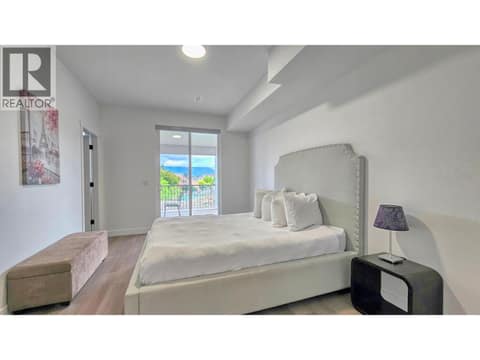 Primary bed walkout at 6857 Madrid Way Unit# 336, Fintry, Kelowna