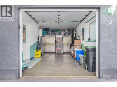 Garage is right off the kitchen - easy to bring in groceries at 6901 Manning Place Unit# 3, Foothills, Vernon