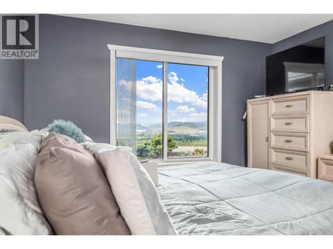 Primary bedroom at 6901 Manning Place Unit# 3, Foothills, Vernon