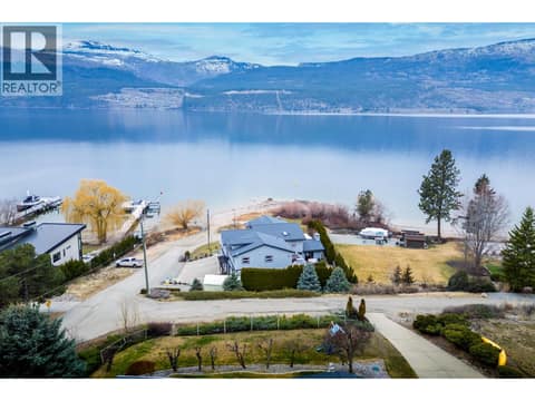 Only steps away from the beach & boat launch! Buoy included (second white Buoy to the right of the yellow one) at 955 Gable Road, Lake Country North West