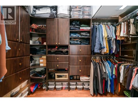 Walk in closet with built in shelving at 955 Gable Road, Lake Country North West