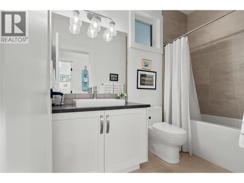 4 piece Main Bathroom at 342 Grange Drive, Predator Ridge, Vernon