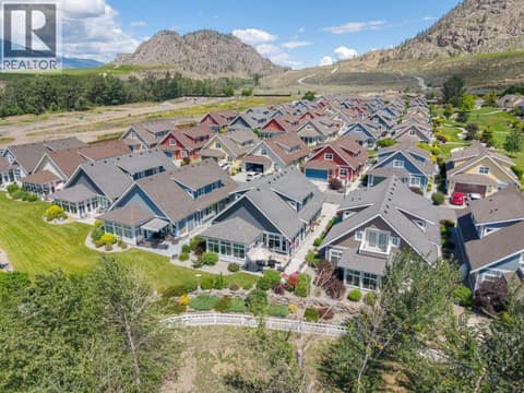 Aerial view backing onto green space at 2450 Radio Tower Road Unit# 38, Oliver Rural