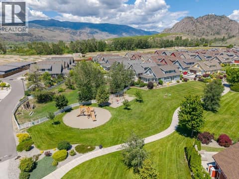 Aerial view off-leash dog park & playground at 2450 Radio Tower Road Unit# 38, Oliver Rural