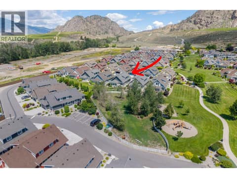 Aerial view off-leash dog park & playground at 2450 Radio Tower Road Unit# 38, Oliver Rural