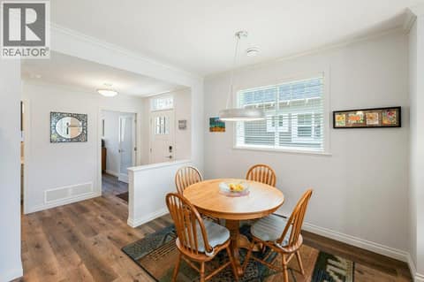 Dining room looking towards front entrance at 2450 Radio Tower Road Unit# 38, Oliver Rural