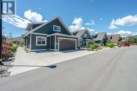 Parking for 3 vehicles including large truck, walkway to back yard at 2450 Radio Tower Road Unit# 38, Oliver Rural
