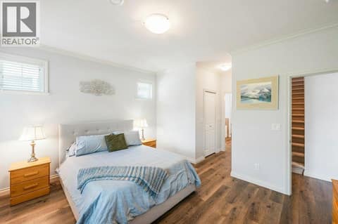 Primary bedroom with walk-in closet at 2450 Radio Tower Road Unit# 38, Oliver Rural