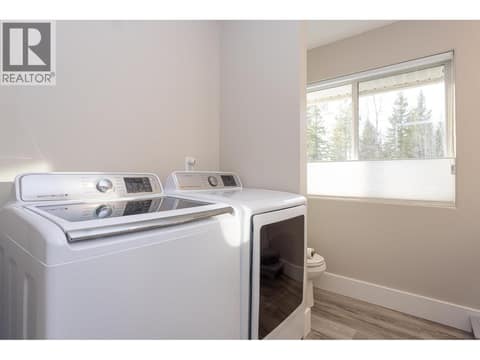 Carriage Laundry at 6720 Langley Court, Ellison, Kelowna
