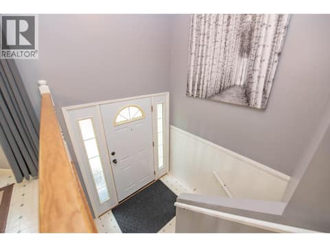 Heading downstairs at 33 Birch Road, Lumby Valley